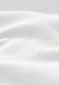 Next Piké - white bulldog embroidery