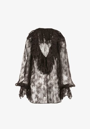 Schwarze Spitzenbluse mit rüschenbesetztem V-Ausschnitt, weiten Ärmeln und filigranen Blumenmustern. Halbtransparent mit strukturiertem Detail.