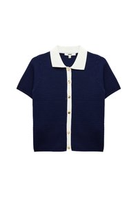 Marinblå stickad kortärmad cardigan med vit krage, prydd med fem gyllene knappar framtill och ribbad fåll. Texturerad materialdetalj.