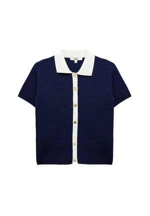 Navy knit short-sleeve cardigan with a white collar, featuring five gold buttons down the front and ribbed hem. Textured material detail.