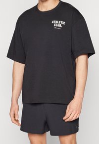 Champion Camiseta estampada - black