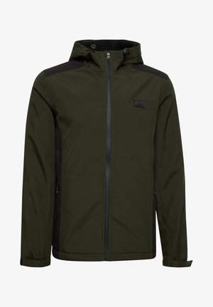 Huppari tummanvihreästä kankaasta mustilla yksityiskohdilla, vetoketjusulku ja teksturoitu paneeli olkapäillä. Toiminnallinen muotoilu sopii ulkokäyttöön.