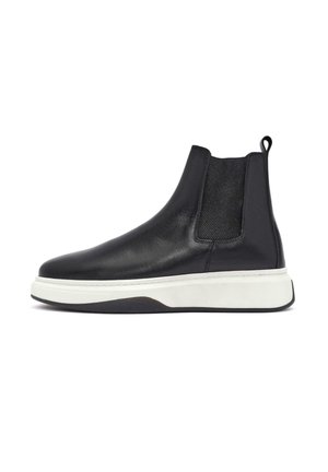 Black leather Chelsea boot with elastic side panels, white rubber sole, and a loop at the back for easy wear. Smooth texture and streamlined design.