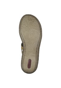 Flexible sole with floral pattern, textured grip, and raised edges; features a smooth, yellow upper section with cut-out designs.