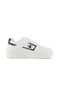 White low-top sneakers with a smooth leather upper, black accents, padded collar, and textured rubber sole. Features logo on side.