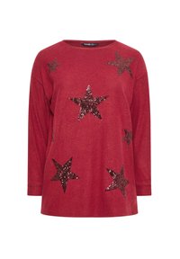 Röd långärmad topp med ribbat mönster, prydd med svarta paljettstjärnor framtill. Rund halsringning och avslappnad passform.