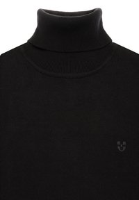 Pull à col roulé noir en tissu tricoté doux. Présente un col montant et un petit logo sombre sur le bas du côté droit.