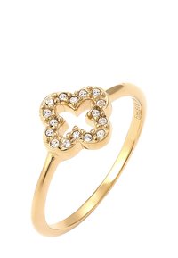 Goldring mit einem Kleeblatt-Design, besetzt mit kleinen, runden, klaren Kristallen. Glatter Reif mit polierter Oberfläche.