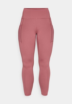Rose-colored leggings made of stretchy fabric, featuring two side pockets, a high waistband, and smooth, seamless detailing throughout.