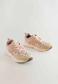 Unselected, rust orange leopard print