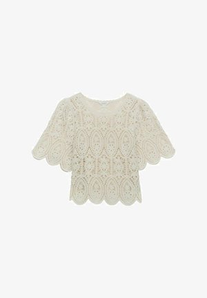 Pitkähihaisella pitsipaidalla, jossa on off-white väri, halkiot ja kukkakuviot. Kevyt, tekstuuri kangas.