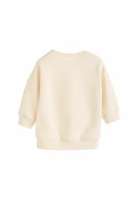 Kremowy, oversize'owy sweatshirt z okrągłym dekoltem, obniżonymi ramionami oraz ściągaczami przy mankietach i hemie. Miękka faktura materiału, prosty design.