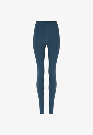 Hoch geschnittene, dunkelteal farbene Leggings in voller Länge mit flachen Nähten, gestaltet für sportliche oder legere Aktivitäten.