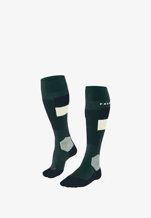 Calze verde scuro fino al ginocchio con motivi variati in crema, blu navale e bianco, con sezioni testurizzate e una punta rinforzata in blu navale.