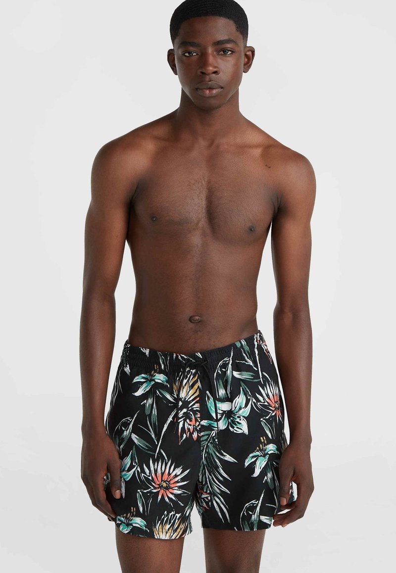 Bañadores negros con un patrón floral colorido. Hechos de una tela ligera, cuentan con una banda elástica en la cintura con cordón.