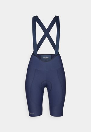 Marine sykkelshorts med kryssede stropper, laget av elastisk materiale. Har en polstret innsats og sømløse sider for komfort.