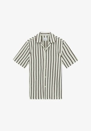 Koszula krótki rękaw z zapięciem na guziki, z kremowym tłem i czarnym wzorem zygzakowym na całej powierzchni. Teksturowana tkanina z kołnierzykiem.