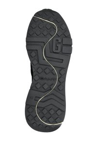 Černá gumová podešev boty s texturovaným vzorem zahrnujícím diamantové tvary, zakřivené drážky a výrazně vyleptaného písmena "G". Velikost 42.
