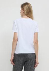 Calliope CON STRASS  - T-shirt imprimé - bianco