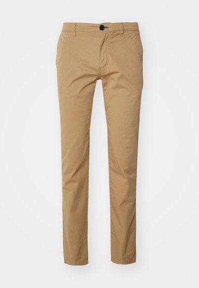 Beige cotton trousers with a slim fit, featuring a single button closure, front pockets, and a smooth texture. Flat front design.