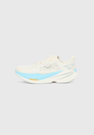 Light cream running shoe with a breathable mesh upper, blue accents, white midsole, and textured rubber outsole. HOKA logo on the side.