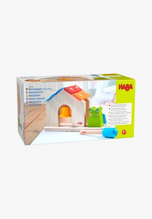 Holz-Musikspielzeug in Form eines Hauses mit Glocke, Froschfigur und blauem Klöppel, entworfen für Kinder ab einem Jahr.