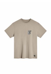 T-shirt en coton beige avec un col rond et des manches courtes. Présente un motif de cartoon avec "Salut !" et un petit logo en bas.