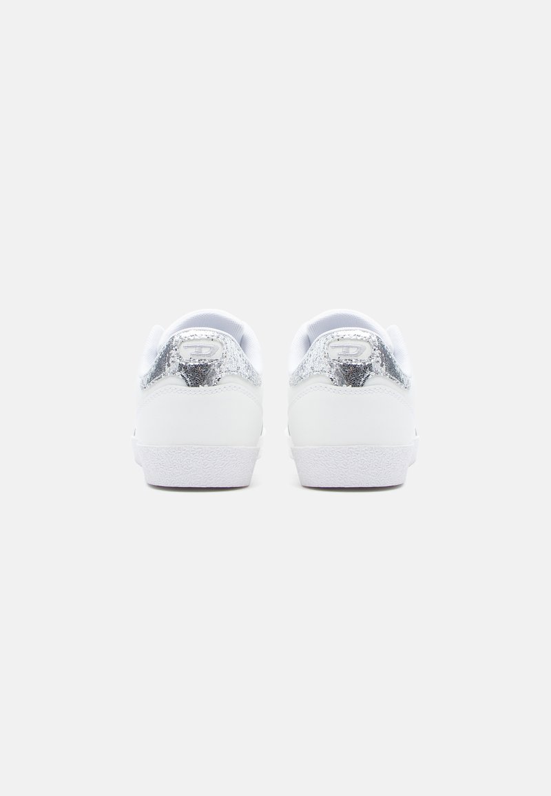 White sneakers with a smooth leather upper and silver glitter accents on the heel. Textured rubber sole and minimalistic design.