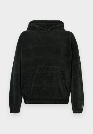 Μαύρο βελούδινο φούτερ με κουκούλα και μπροστινή τσέπη, με λεπτό μοτίβο σε τόνους του ίδιου χρώματος και μικρό λογότυπο στο αριστερό μανίκι. Μαλακή υφή.