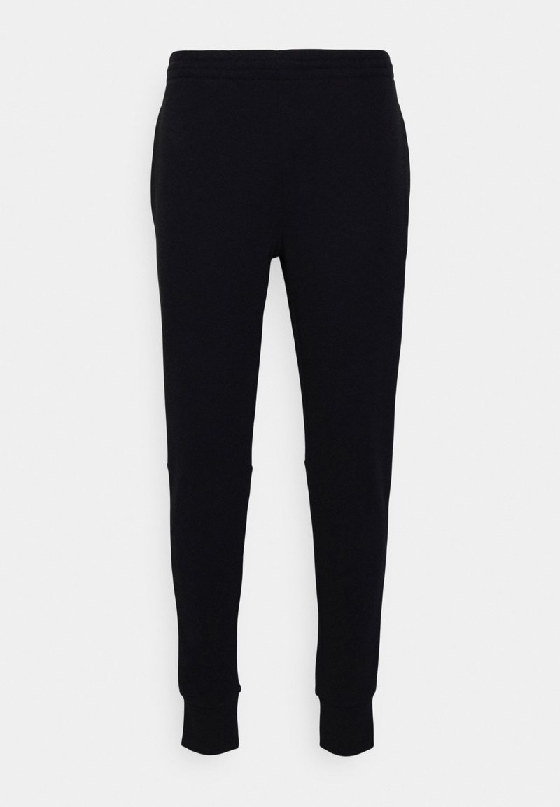 Black sweatpants made of soft fabric, featuring a tapered fit, elastic waistband, and ribbed cuffs at the ankles. No visible patterns.