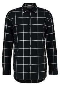 Camicia nera a maniche lunghe con bottoni, caratterizzata da una grande fantasia a griglia bianca e colletto a punta.