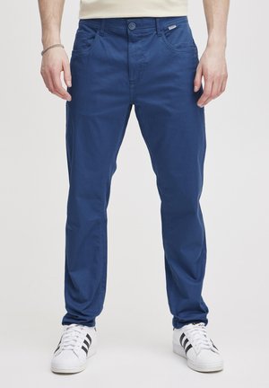 Blue cotton chinos with a straight fit, featuring a zip fly, button closure, side pockets, and contrasting stitching details.