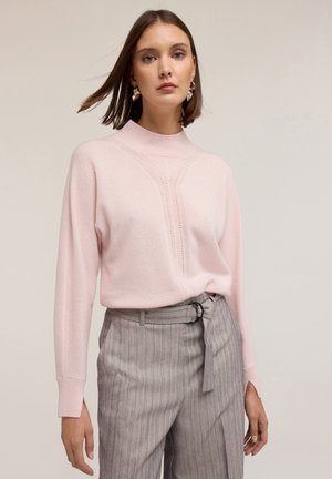 - Sweter