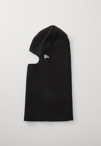 Schwarze gestrickte Balaklava mit Ausschnitt für das Gesicht. Verf�ügt über ein kleines weißes Logo an der Seite. Weiche Textur, enge Passform und verlängerte Form.