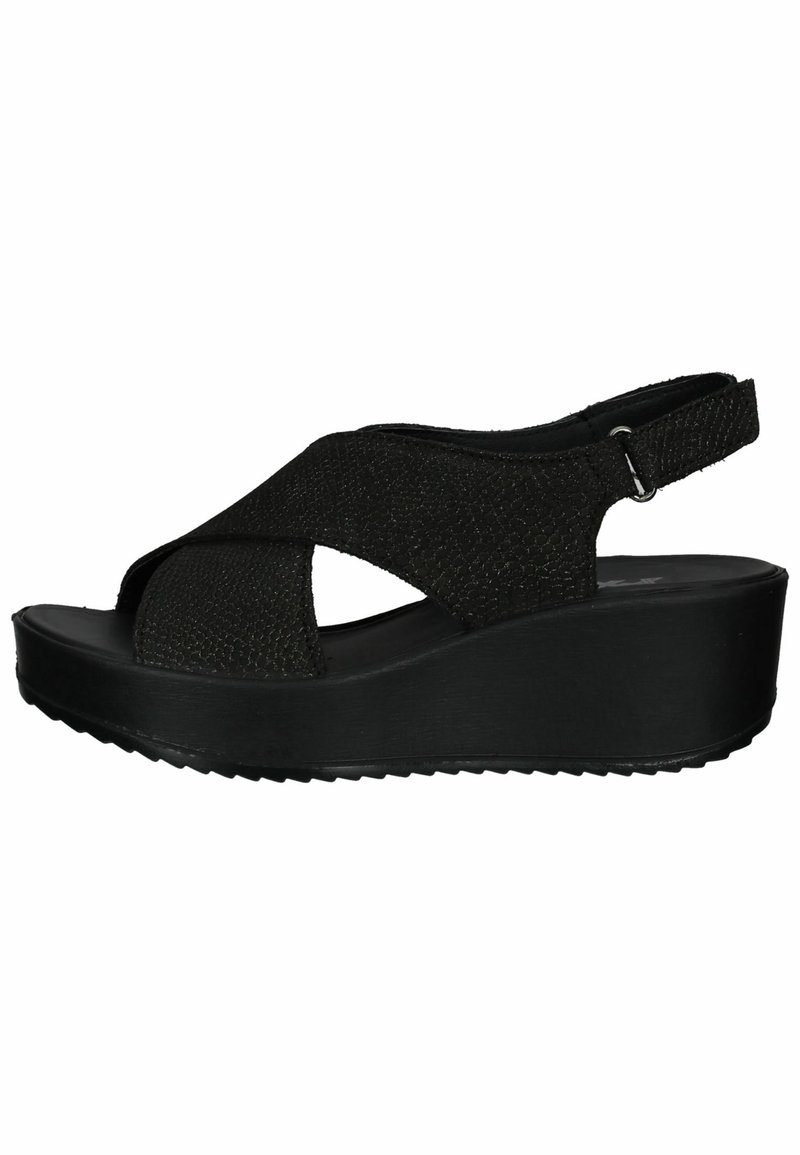 Black wedge sandals with a textured fabric upper, featuring crisscross straps and a rear ankle strap. Textured sole for added grip.