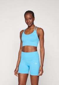 ICANIWILL DEFINE SEAMLESS BRA - Sportski grudnjak sa srednje jakom potporom - pacific blue
