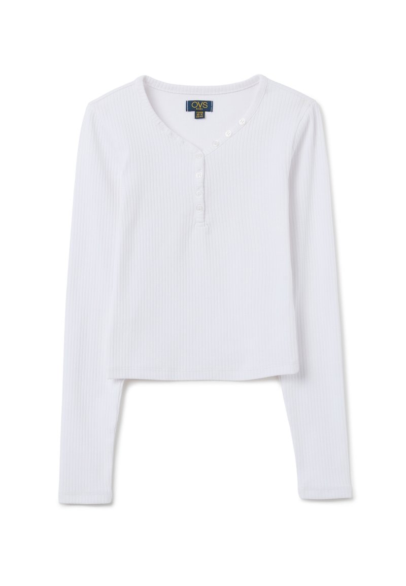 Witte lange mouw crop top gemaakt van ribstof, met een V-halslijn en vijf knopen aan de voorkant. Zachte textuur en getailleerd ontwerp.