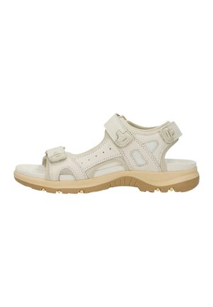 Sandale beige d'extérieur avec brides réglables, semelle intérieure rembourrée et semelle extérieure robuste couleur tan conçue pour le confort et le maintien.