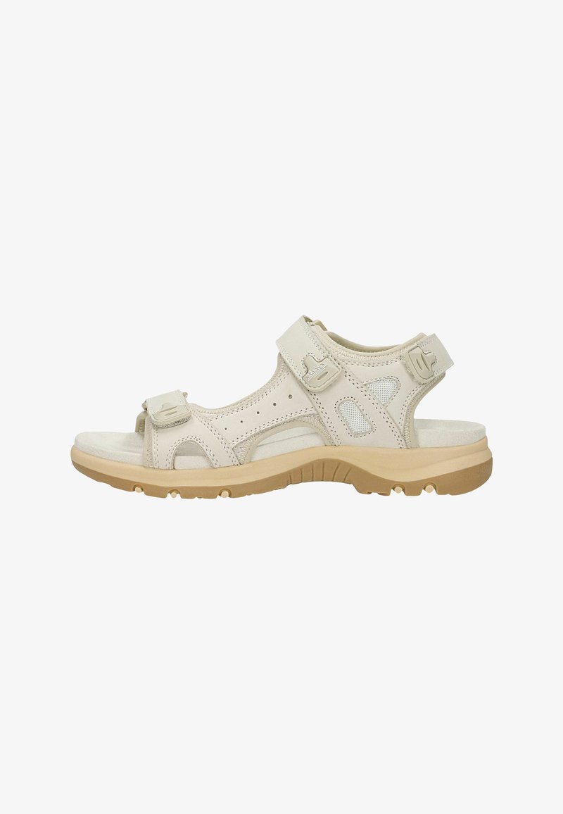 Sandale beige d'extérieur avec brides réglables, semelle intérieure rembourrée et semelle extérieure robuste couleur tan conçue pour le confort et le maintien.