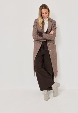 Tamaris Gležnjarji s platformo - beige
