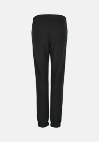 Pantalon de survêtement noir avec une taille élastique et des poignets, fabriqué à partir d'un matériau doux et extensible, et présentant un design simple et classique.