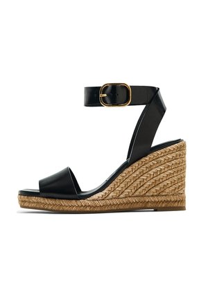 Black wedge sandal with a smooth leather upper, adjustable ankle strap featuring a gold buckle, and jute-wrapped wedge heel.