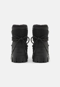Guess UNIQUES Snowboot/Winterstiefel black/schwarz Zalando