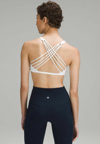 lululemon FREE TO BE WILD - Sujetadores deportivos con sujeción ligera - white