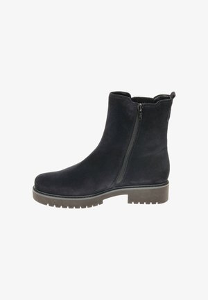 Black suede ankle boot with a side zipper, rounded toe, and textured rubber sole featuring deep tread for grip.