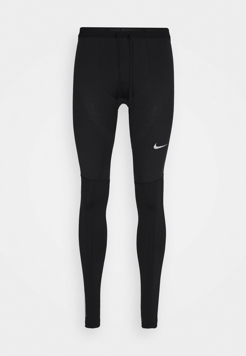Collants de course noirs en matériau extensible, dotés d'une taille avec cordon de serrage, de motifs texturés et d'un petit logo Nike blanc sur la cuisse.