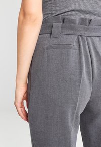 KIOMI Tygbyxor - mottled grey