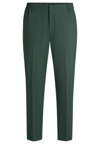 Pantalons ajustés verts avec un waistband élastique, fermeture à bouton sur le devant et design à jambe droite. Tissu lisse avec un léger éclat.