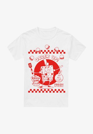 White t-shirt featuring red graphic design of a cartoon character with a spatula, text "ORDER UP!", and checkered pattern.