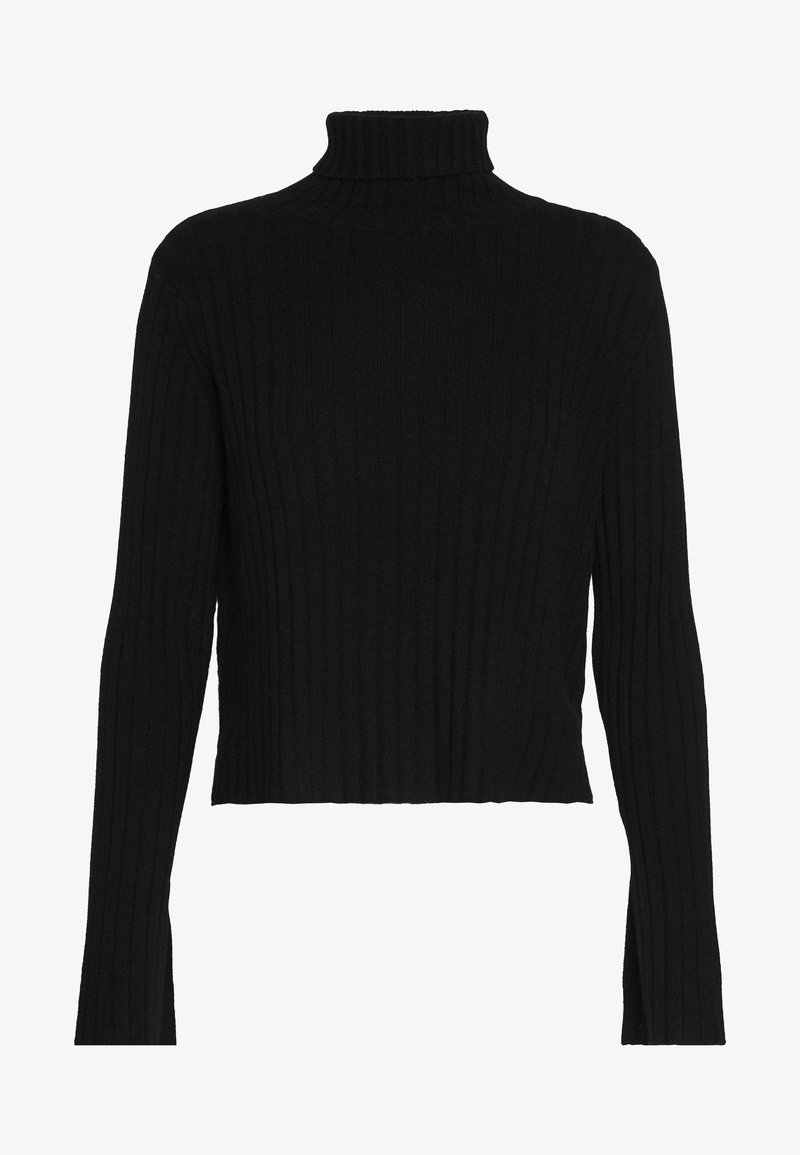Sort cropped rullekrave sweater med ribbet tekstur og lange ærmer. Har en høj krave og en tætsiddende silhuet.